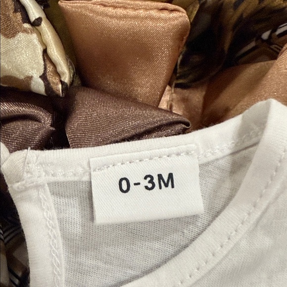 Kids one piece size 0-3 months & new socks and bow price is firm - Picture 3 of 6